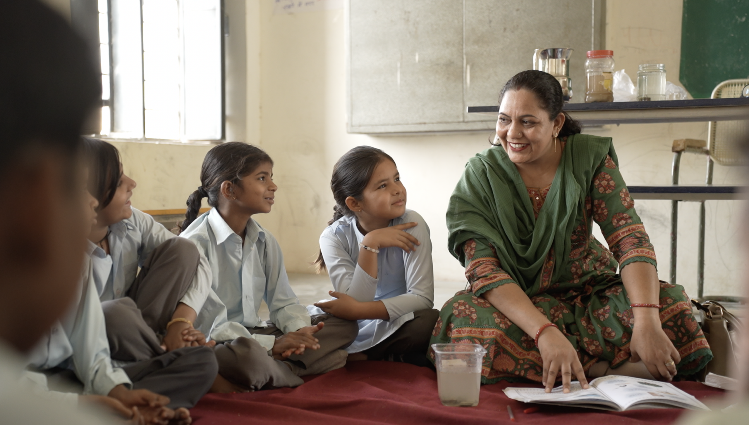 teacher with children khushi shala classroom